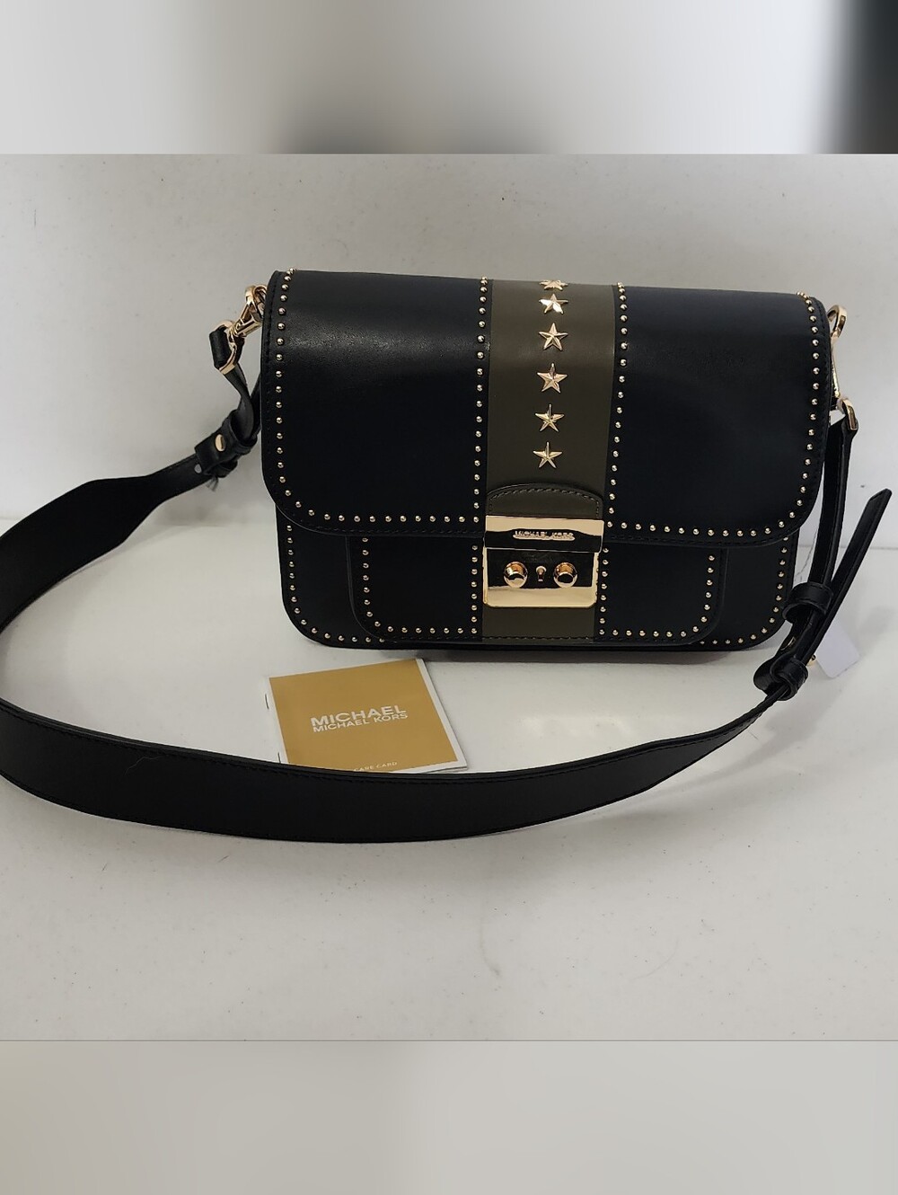 Michael Kors Black Leather Star-Accent Crossbody with Gold Hardware
